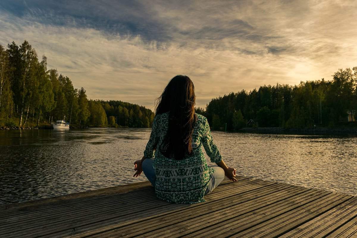 sitting-by-lake