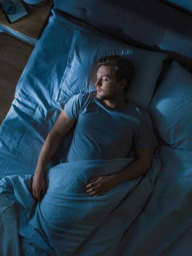 man-sleeping-bed