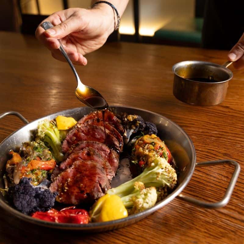 Leo: Gold-Dusted Prime Rib with Dramatic Tableside Flambé
