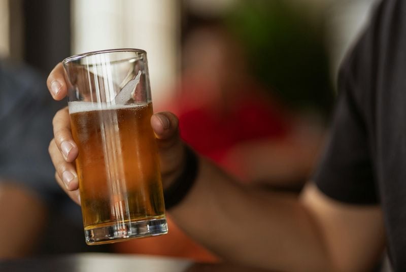 Holding an Alcoholic Drink
