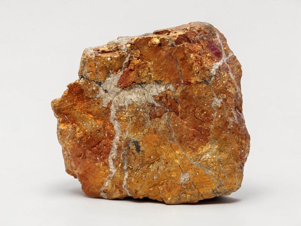 gold metal stone